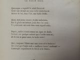 an old book with a black and white image on it