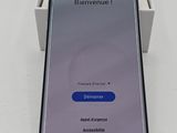 the back of a samsung s9 with the box open on the table