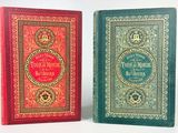 deux livres sont posés côte à côte sur une surface blanche