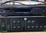 an image of a stereo system sitting on top of a wooden table
