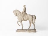 statue of a man on a horse on a white background