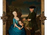 portrait d'un homme et d'une femme avec un enfant dans un paysage