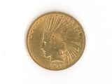 une pièce d'or représentant une tête d'Indien sur un fond blanc
