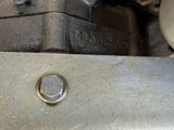 a close up view of a motorcycle engine with nozzles on it