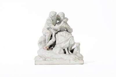 une statue représentant deux personnes et un chien sur un fond blanc