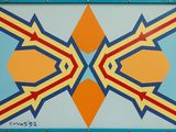 tableau représentant un motif géométrique bleu et jaune, rehaussé de touches de rouge, de jaune et de bleu