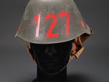a close up of a helmet on a mannequin head