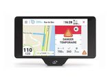 un gros plan d'un appareil GPS posé sur une surface blanche