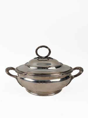 a silverplated casserole dish with handles and handles