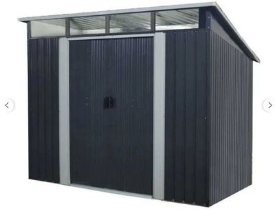 an image of a metal shed with a roof and a door