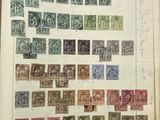 a book with a bunch of stamps on it