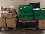many boxes stacked on top of each other in a warehouse