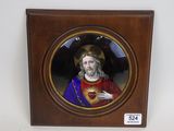 tableau représentant un homme coiffé d'une couronne, dans un cadre en bois