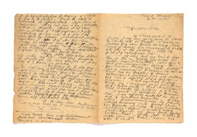 an old book with writing on it and a pen in it