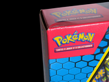 a box of pokemon cards sitting on a table