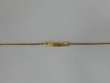 a gold bracelet with a clasp on a white background