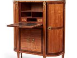 an image of a wooden cabinet with a marble top
