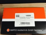 an orange and black box on a wooden table with a barcode on it