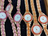 a lot of watches that are in a box