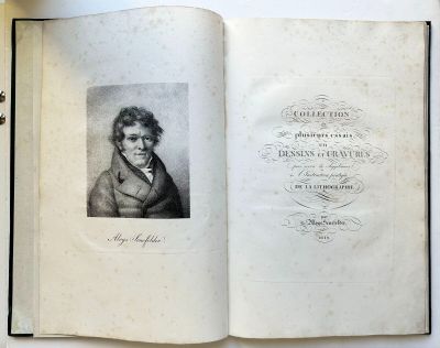 an open book with a picture of a man in a coat on top of a table