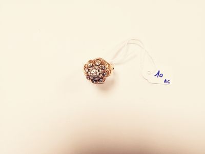 a small bead that is sitting on a white surface