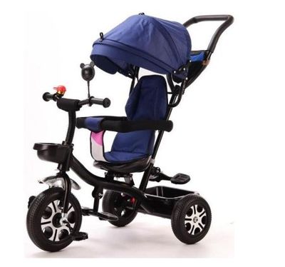 a close up of a tricycle with a blue cover on it