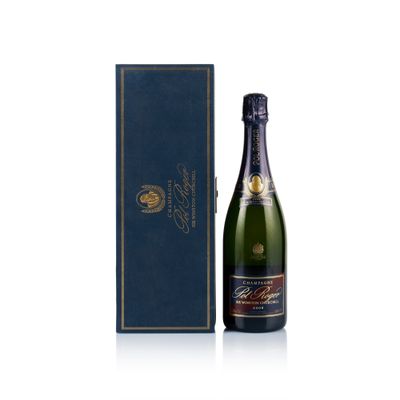 a bottle of champagne in front of a blue box