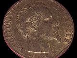 l'image d'une pièce d'or sur laquelle figure le visage d'une femme