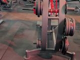 an image of a gym room with a lot of equipment