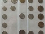 a lot of coins in a plastic bag on the table