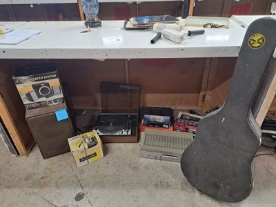 a guitar case sitting on top of a table in a room