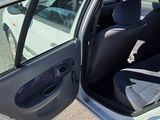 a car that has its door open and a seat in it