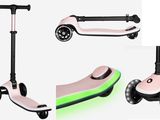un gros plan sur un scooter rose avec des roues et encore des roues