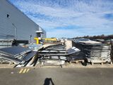 a large pile of metal on the side of the road