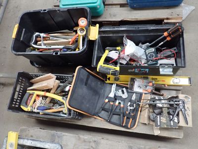 a lot of tools that are sitting on the floor