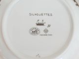 a white plate with a picture of a ship on it