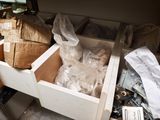 a box full of assorted items sitting on the floor