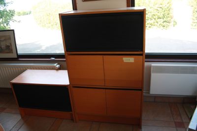 a television that is sitting on top of a cabinet
