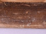 a close up of a piece of wood with a piece of wood sticking out of it