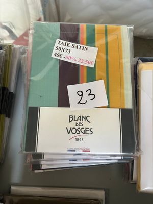 a lot of books on a table with a lot of papers