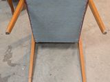 two chairs and a table in a room