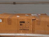 a cardboard box sitting on top of a pallet