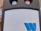 a picture of a box with two gauges and a box with two gauges
