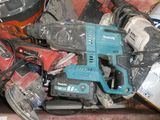 a pile of tools that are sitting on the floor