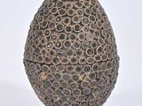 an image of a decorative egg on a white surface
