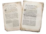 an old book with two pages that are open on top of each other