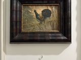 a picture of a painting hanging on the wall