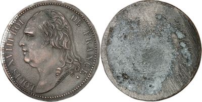 a close up of a coin on a white background