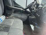 a bottle of water in the back seat of a truck