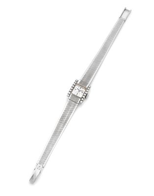 an image of a silver watch with a diamond on the face